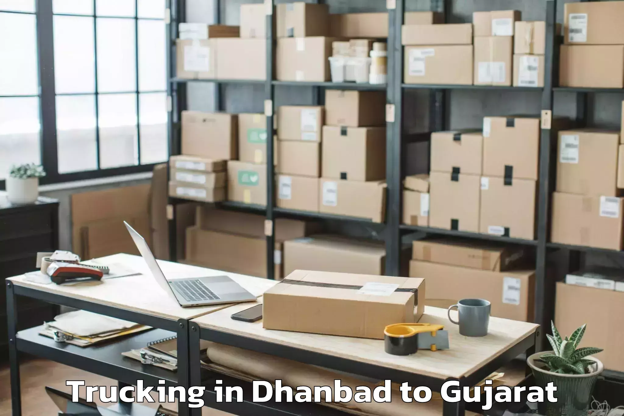 Quality Dhanbad to Hazira Trucking